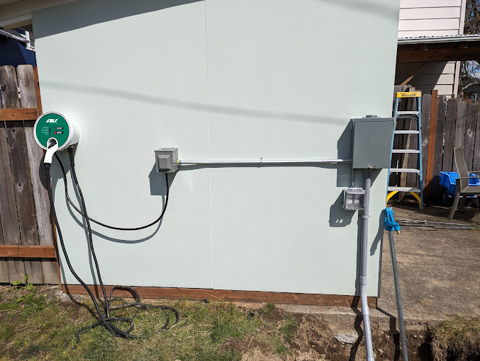 A phone is plugged in to a wall