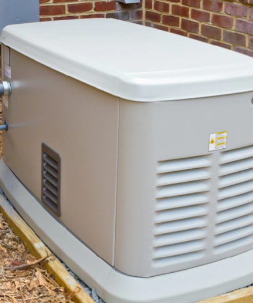 A large white box sitting next to a brick wall